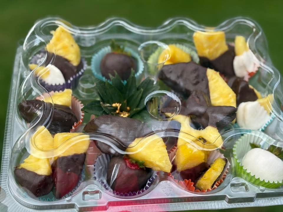 Chocolate Covered Pineapples, Strawberries and other in season fruit.